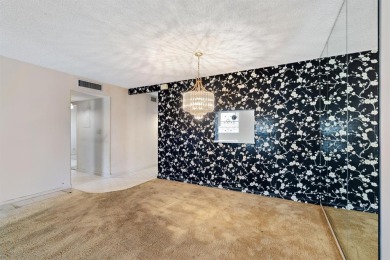 This spacious 2-bedroom, 2-bathroom condo offers a wonderful