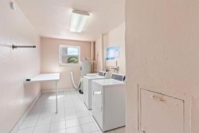 This spacious 2-bedroom, 2-bathroom condo offers a wonderful