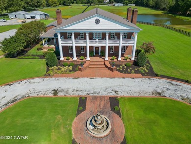 Nestled on 10 breathtaking acres just outside Jackson, this