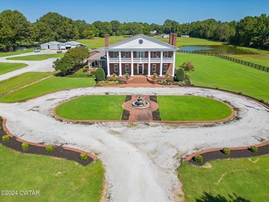 Nestled on 10 breathtaking acres just outside Jackson, this