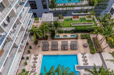Modern 2BR/3BA condo at 2 Midtown Miami featuring