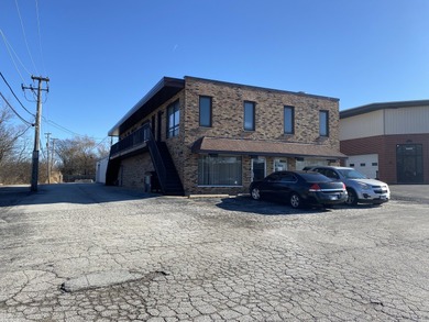 VERSATILE & HIGHLY VISIBLE 7,688 SF OFFICE/WAREHOUSE BUILDING ON