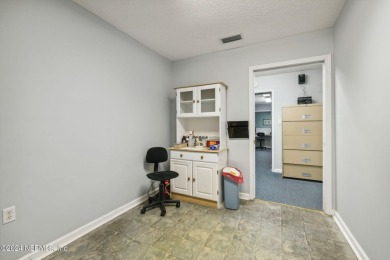 EXCELLENT CORNER LOCATION at Dunn Ave. and Duval Rd. with EXTRA