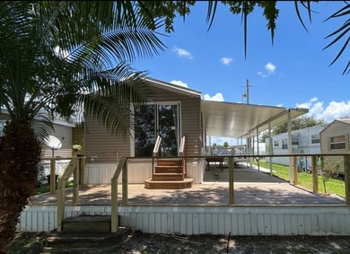 Enjoy peaceful waterfront living in this spacious 3-bedroom