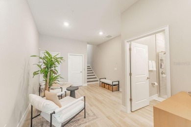 This exquisite four-bedroom, three-and one-half bath luxury