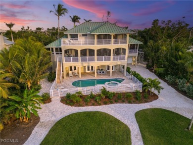 This meticulously refined Gulf-front estate embodies the essence
