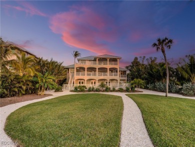 This meticulously refined Gulf-front estate embodies the essence