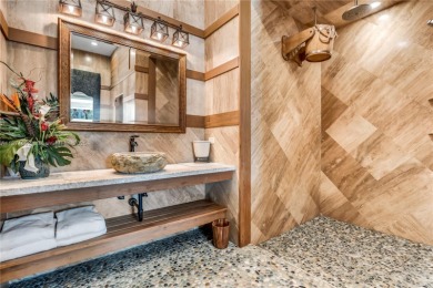 Offering nearly 16,000 sq ft of elevated indoor/outdoor living