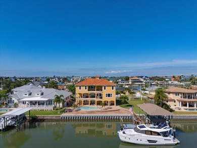 Nestled in the highly coveted Harbor Bluffs community, this