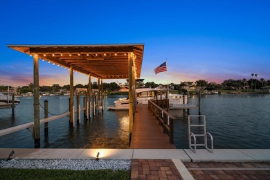 Nestled in the highly coveted Harbor Bluffs community, this