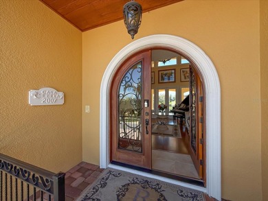 Nestled in the highly coveted Harbor Bluffs community, this