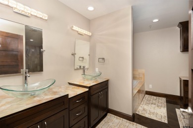 Experience luxury high-rise living in this stunning 4-bedroom