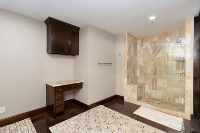 Experience luxury high-rise living in this stunning 4-bedroom