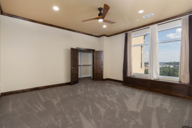 Experience luxury high-rise living in this stunning 4-bedroom