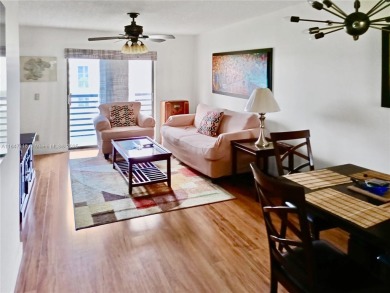 Enjoy stunning golf course and lake views from this bright