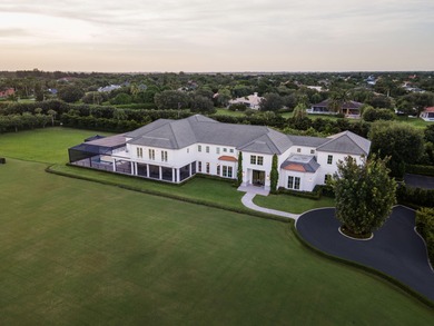 Nestled within the prestigious gated enclave of Palm Beach Point