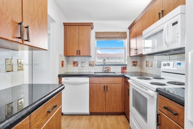 Enjoy peaceful lake views from this bright and quiet 2-bed