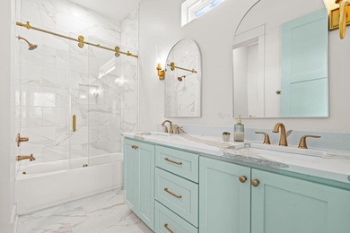 Motivated Seller! This 5 BR, 4 baths coastal home by Ben Wortman