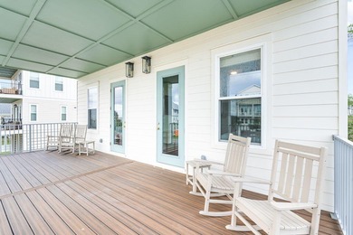 Motivated Seller! This 5 BR, 4 baths coastal home by Ben Wortman