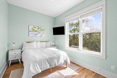 Motivated Seller! This 5 BR, 4 baths coastal home by Ben Wortman