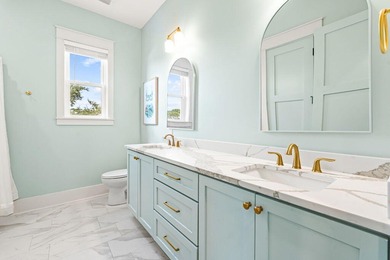 Motivated Seller! This 5 BR, 4 baths coastal home by Ben Wortman