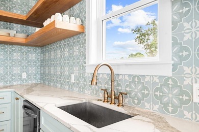 Motivated Seller! This 5 BR, 4 baths coastal home by Ben Wortman