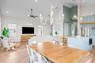 Motivated Seller! This 5 BR, 4 baths coastal home by Ben Wortman