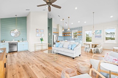 Motivated Seller! This 5 BR, 4 baths coastal home by Ben Wortman