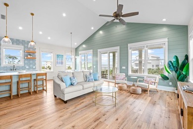Motivated Seller! This 5 BR, 4 baths coastal home by Ben Wortman