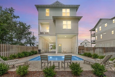 Motivated Seller! This 5 BR, 4 baths coastal home by Ben Wortman