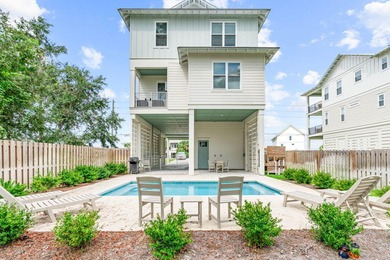 Motivated Seller! This 5 BR, 4 baths coastal home by Ben Wortman