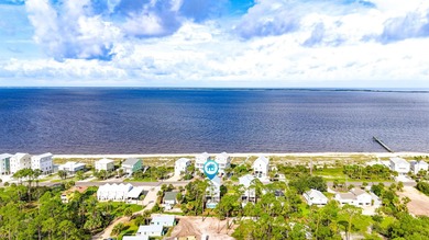 Motivated Seller! This 5 BR, 4 baths coastal home by Ben Wortman