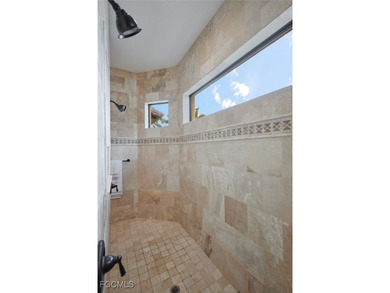 Welcome to luxury living in the desirable Surfside Blvd area of