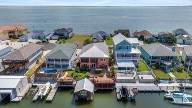 Stunning Canal-front Residence in City By The Sea. This gem is a