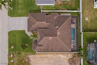 Welcome to luxury living in the desirable Surfside Blvd area of