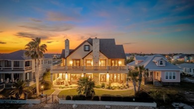 A stunning French-style home situated along a dramatic coastal