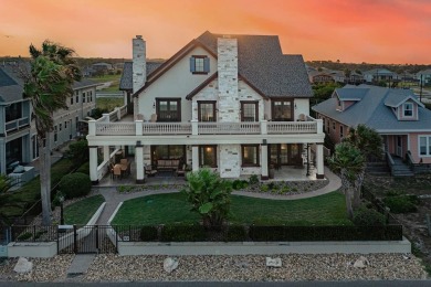 A stunning French-style home situated along a dramatic coastal