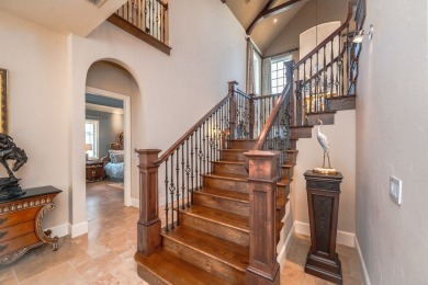 A stunning French-style home situated along a dramatic coastal