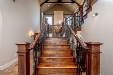 A stunning French-style home situated along a dramatic coastal