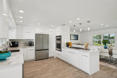 Welcome to this beautifully renovated executive residence