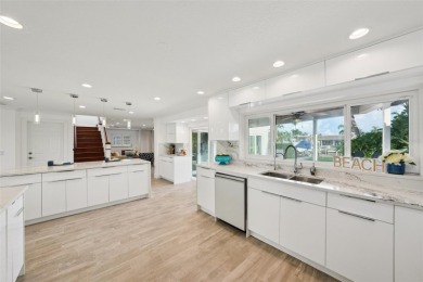 Welcome to this beautifully renovated executive residence