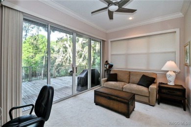 Nestled at the end of a quiet street on a wooded property along