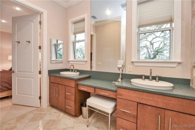 Nestled at the end of a quiet street on a wooded property along