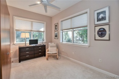 Nestled at the end of a quiet street on a wooded property along