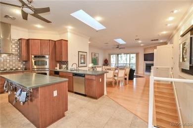 Nestled at the end of a quiet street on a wooded property along