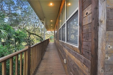 Nestled at the end of a quiet street on a wooded property along