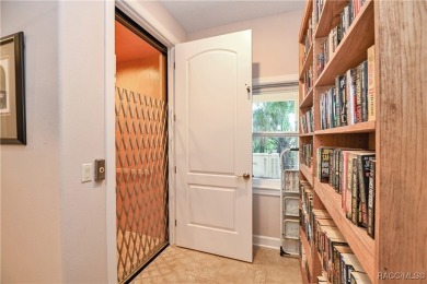 Nestled at the end of a quiet street on a wooded property along