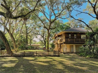 Nestled at the end of a quiet street on a wooded property along