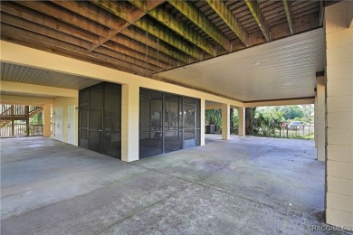 Nestled at the end of a quiet street on a wooded property along