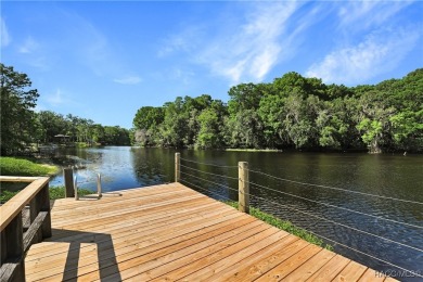 Nestled at the end of a quiet street on a wooded property along